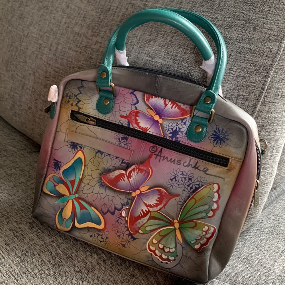 Brand new ANUSCHKA leather hand painted butterfly purse. All round crossbody bag